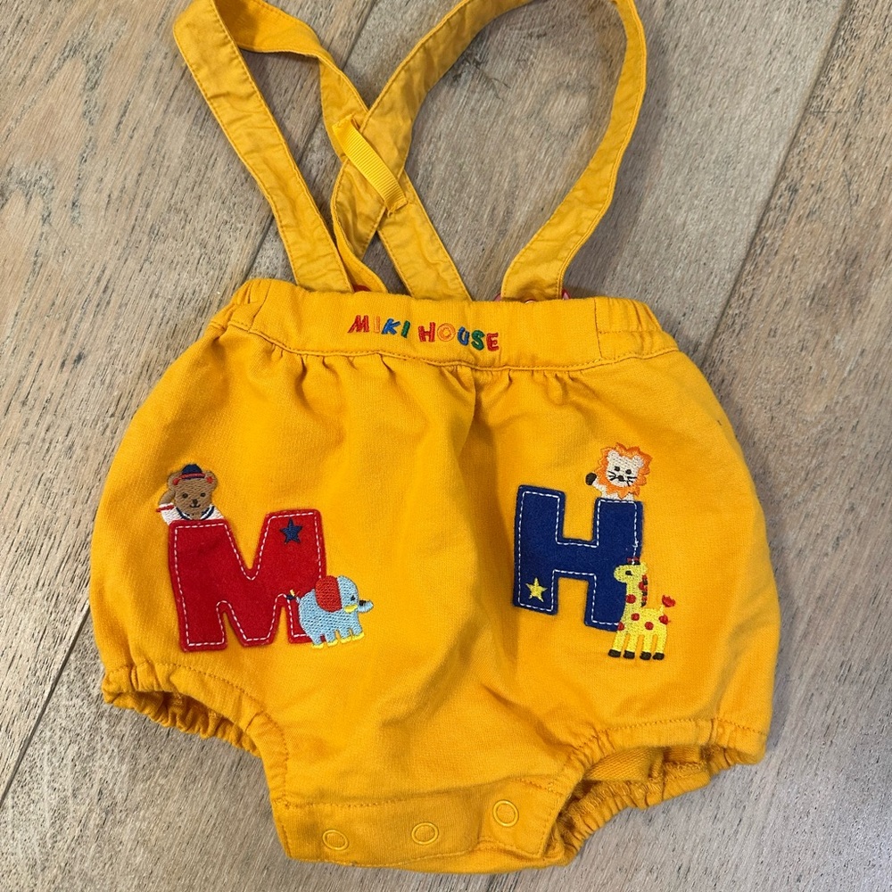 Yellow and Red Overalls with Decorative Appliqués
